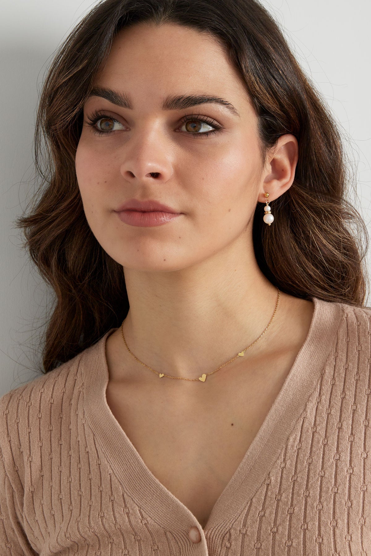 collar clásico con corazones