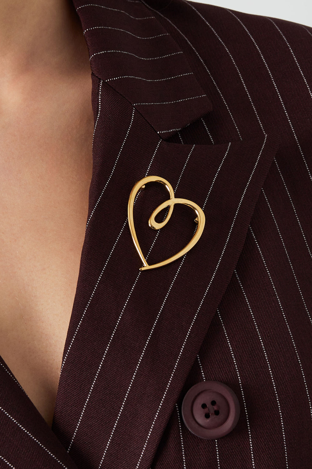 broche corazón loco