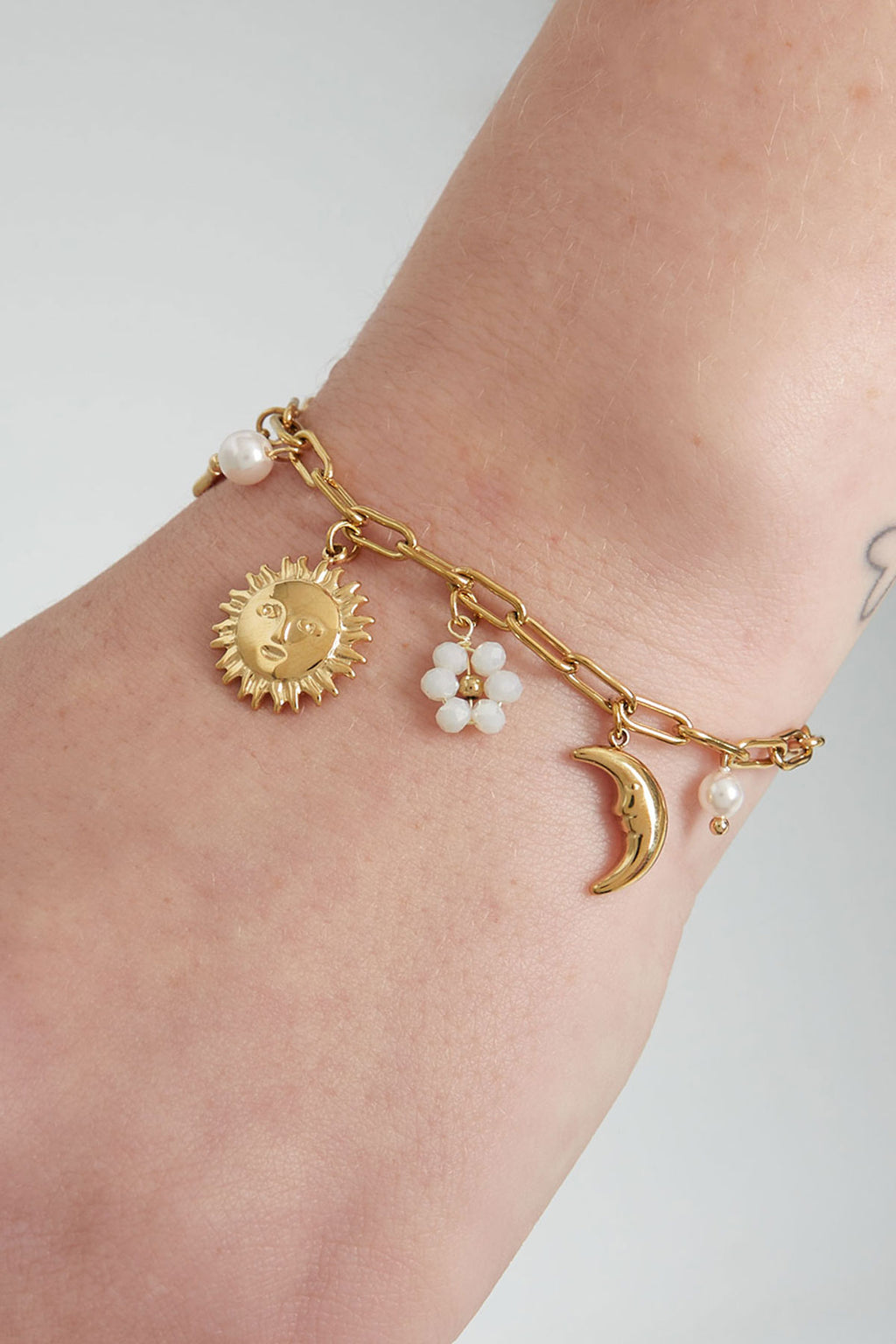 Elegant Charm Bracelets in Silver & Gold