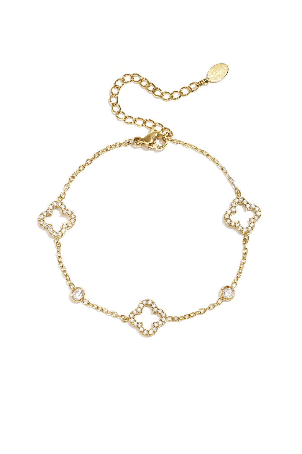 Pulsera con calado e incrustaciones de tréboles y piedras.