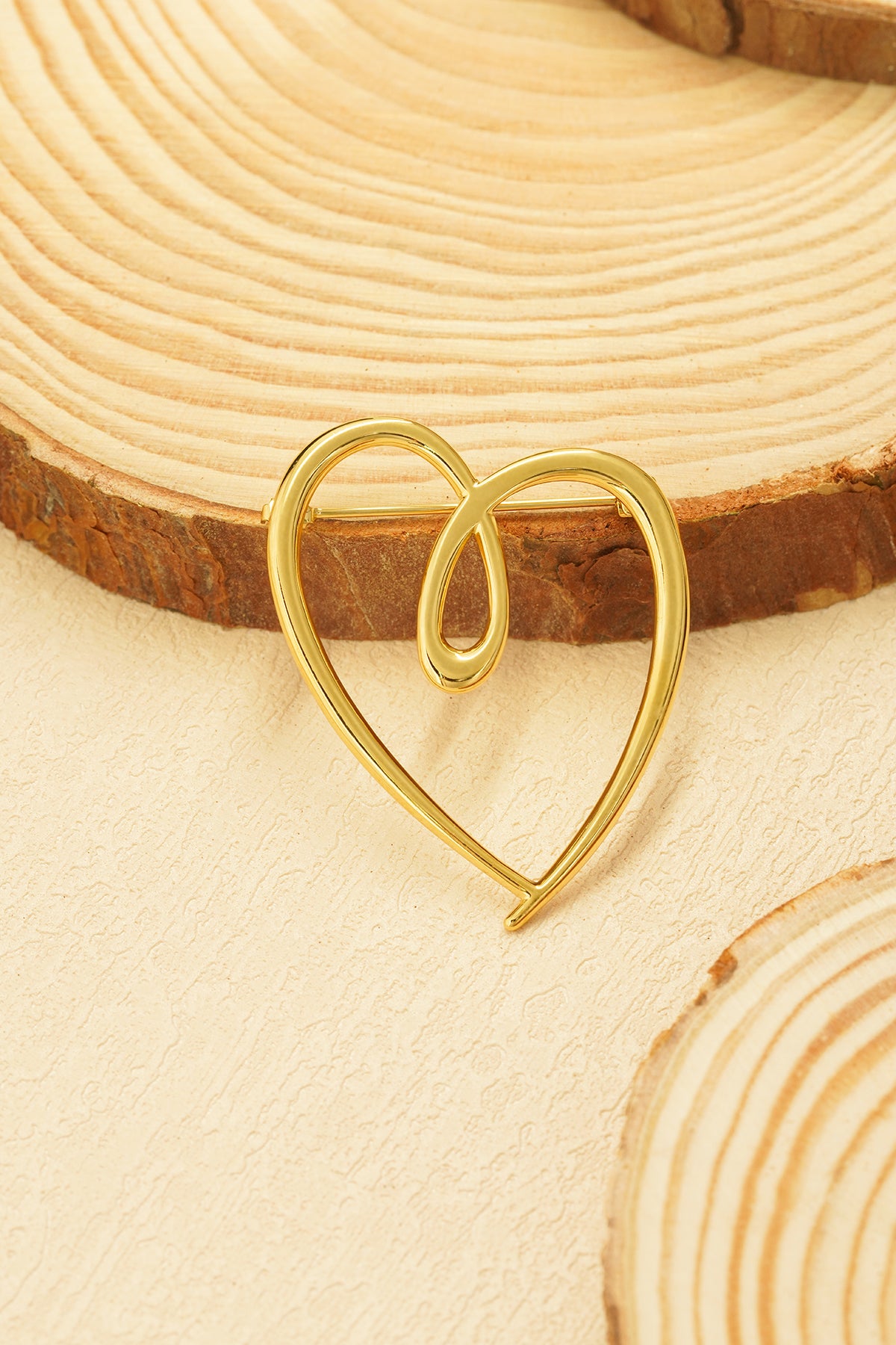 broche corazón loco