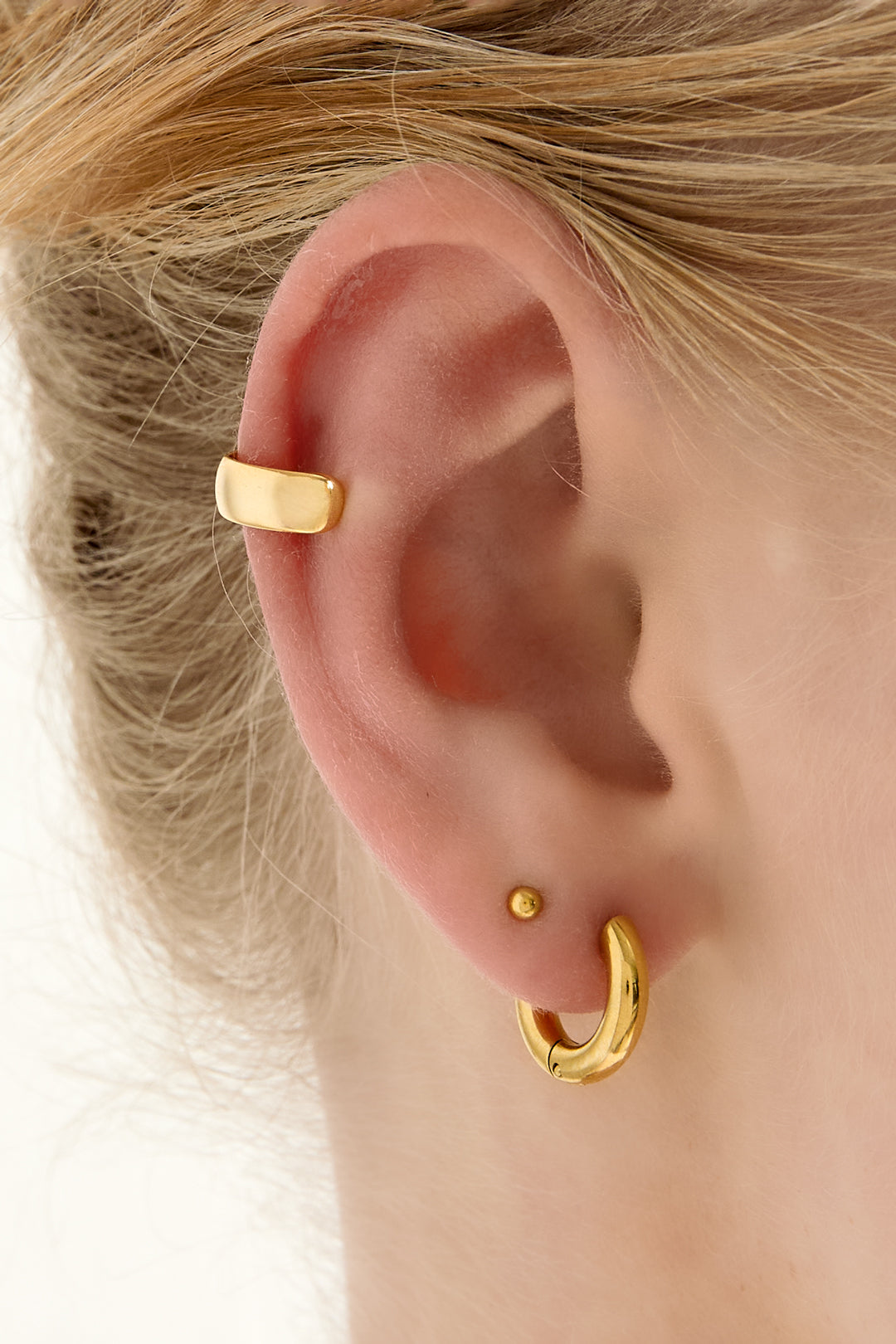 Muñeca diaria con puños de oreja