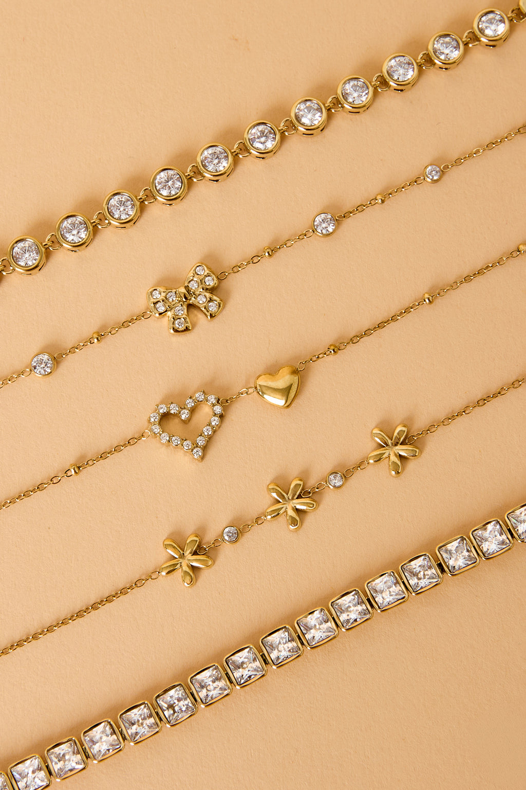 Pulseras con dijes de acero inoxidable chapadas en oro de 14 quilates con nudo de lazo, estilo sencillo para uso diario, serie Simple. Joyería para mujer.