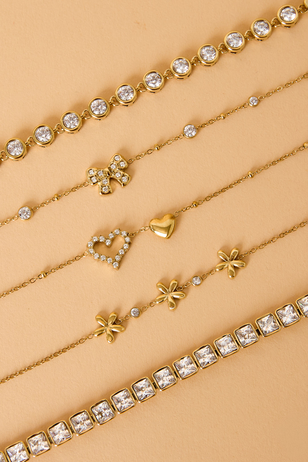 Pulseras con dijes de acero inoxidable chapadas en oro de 14 quilates con nudo de lazo, estilo sencillo para uso diario, serie Simple. Joyería para mujer.