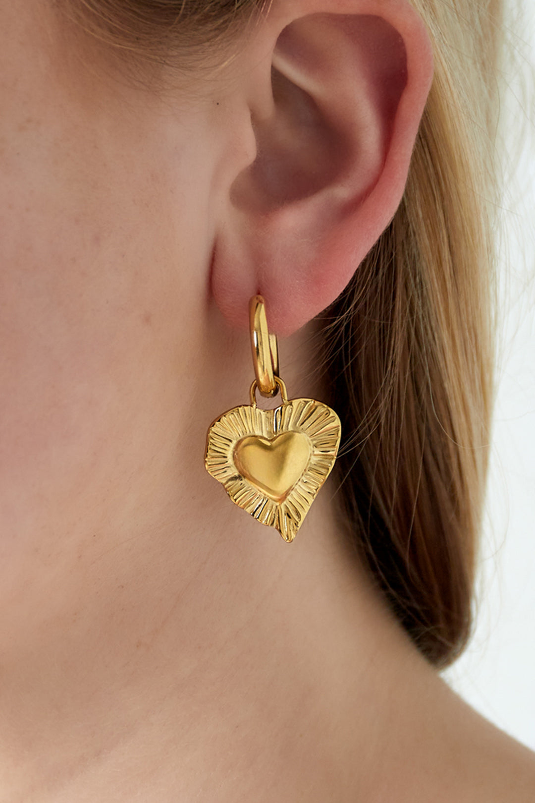 Pendientes de corazón radiante